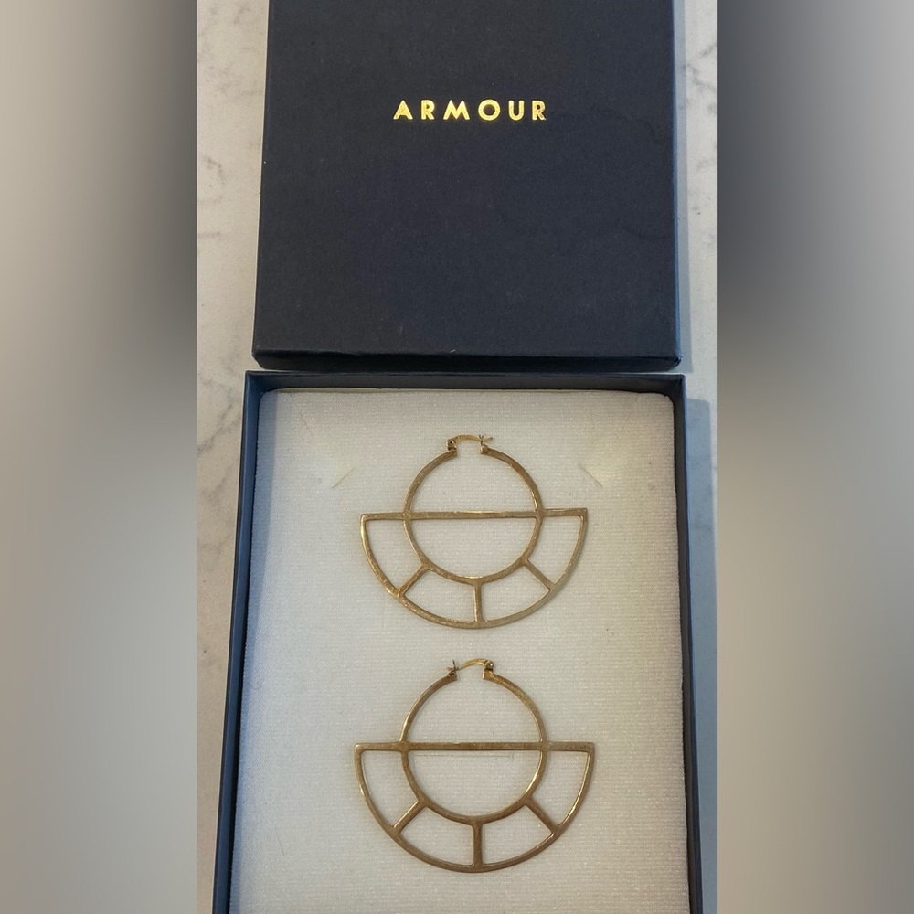 Armour Jewelry Solar Noon statement earring in gold. Sold out online.